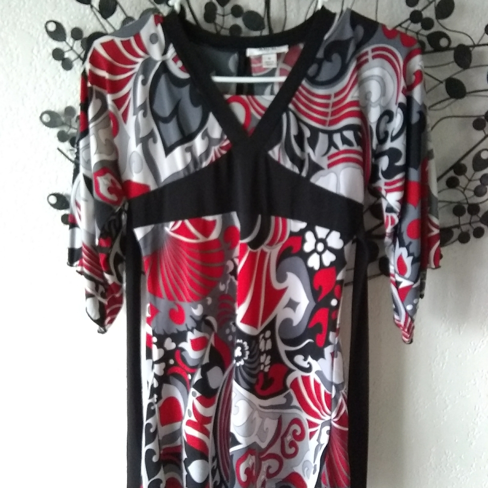 Blouse by 'Ally B' in a size Medium.